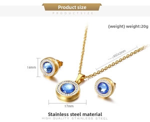 Detail showing dimensions and material of gold necklace and blue crystal stud set