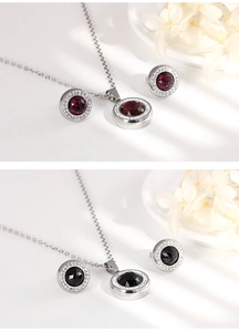 Macro view of crystal glass jewelry set with necklace and earrings in silver tone