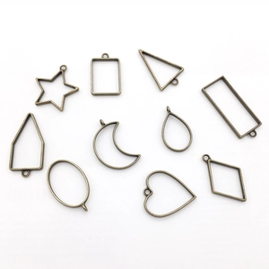 Selection of 10 bronze geometric hollow frame pendants for DIY jewelry making