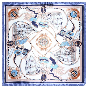 Detail of hand-drawn sailing boat pattern on silk scarf with rolled edges and nautical theme