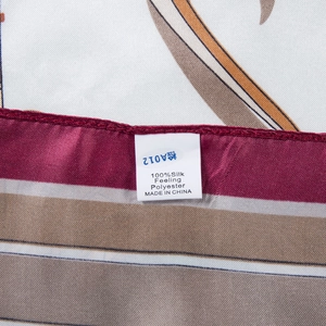 Close-up of washing label and high-quality stitching on 90cm silk feeling scarf