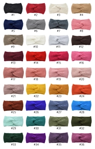 Detailed grid display showcasing 36 color variants of knitted criss-cross headbands