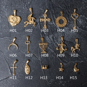 Assorted gold plated stainless steel pendants including unicorn and moon designs