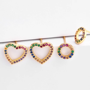 Colorful zircon heart and round stud earrings with gold plating on white display