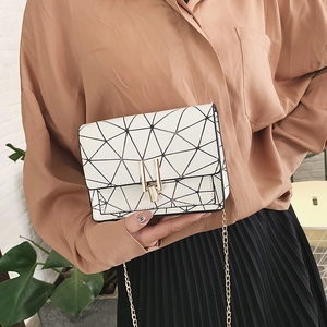 Chic white geometric patchwork crossbody bag with gold chain strap for women