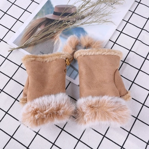 Detail of camel faux suede gloves with fluffy plush cuffs and warm fleece lining