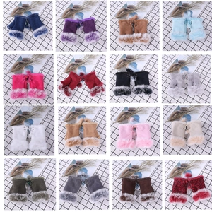 Detailed grid showing sixteen colorful faux suede fingerless gloves with faux fur trim