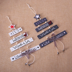 Wooden Christmas tree wall decor with star topper and plaid bow in white and grey colors