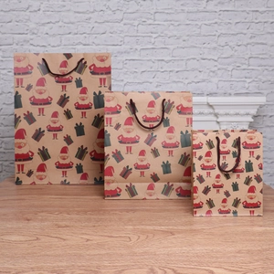 Three-piece set of Christmas kraft paper gift bags with Santa Claus patterns and handles