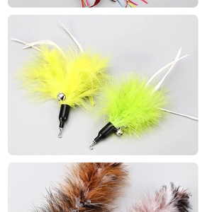 Detail of colorful feather cat wand refills with silver bells and metal hook attachment