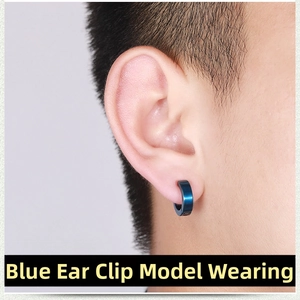 Close-up of blue stainless steel U-shaped clip-on earring on male model ear