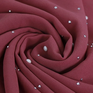 Burgundy chiffon hijab with elegant white pearls and silver rhinestones in spiral fold