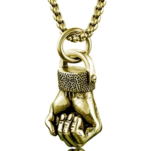 Detailed close-up of golden fist pendant with box chain on a solid white background