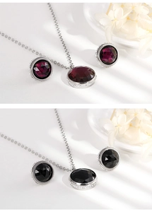 Detail of titanium steel jewelry sets featuring round zircon necklaces and earrings in two colors