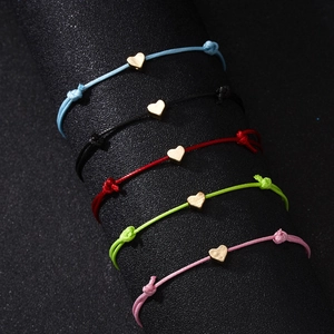 Adjustable woven cord bracelets with golden heart charms in five vibrant colors