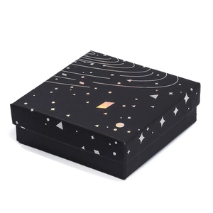 Elegant black square jewelry gift box with silver star orbit pattern on top