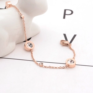 Rose gold chain bracelet with minimalist cubic zirconia studs and lobster clasp closure