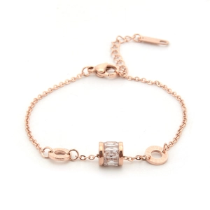 Rose gold stainless steel bracelet with Roman numeral rings and pavé zircon cylinders