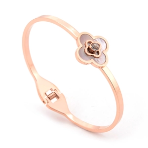 Rose gold clover projection bracelet with white shell inlay and center zircon stone