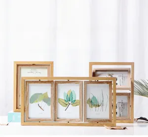 Close-up of rotating wooden photo frame with transparent double-sided 4x6 display