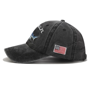 Vintage washed charcoal baseball cap featuring American flag embroidery and shark icon
