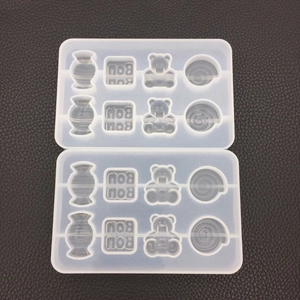 Translucent silicone mold featuring candy bears and BOB letter shapes for DIY resin crafts