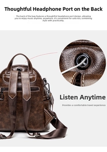 Detail of the back headphone port and lychee grain leather on dark brown backpack