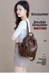 Side view of dark brown vintage oil-wax leather backpack with multiple zipper compartments