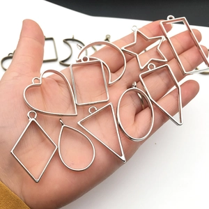 Handheld silver geometric alloy resin frames including heart and star shapes for DIY jewelry