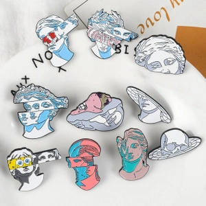 Set of 10 artistic enamel pins featuring classical statues and pop culture characters