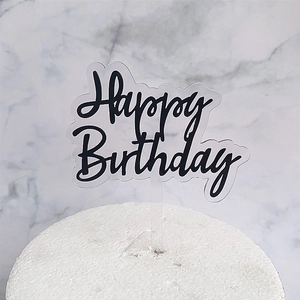 Transparent acrylic Happy Birthday cake topper with elegant black lettering for party decor