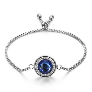 Bracelet ajustable en argent avec pendentif cristal bleu entouré de strass scintillants