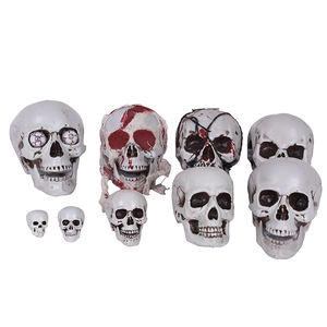 Realistic Halloween prop skulls set with bloody details and light-up features
