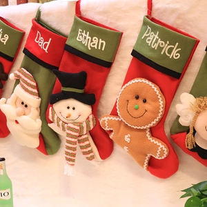 Set of 4 personalized Christmas stockings with Santa and snowman for holiday tree decor