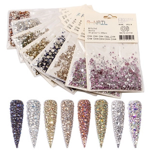 Macro detail of various sizes of multi-colored hotfix nail rhinestones in bulk packaging