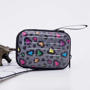 Mini hard shell carrying case with colorful leopard print and secure zipper closure
