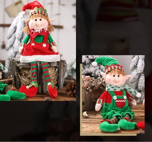 Detail of Christmas sitting elf dolls with long legs on a vintage wooden shelf