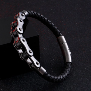 Street fashion men's genuine leather bracelet with bicycle chain design on black stand