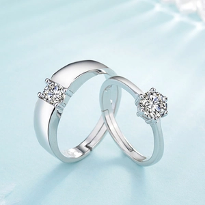 Adjustable silver couple rings with six-prong round cubic zirconia in water ripple lighting