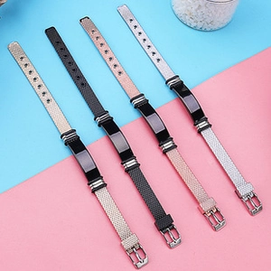 Detail of multi-color titanium steel bracelets with black silicone and woven texture