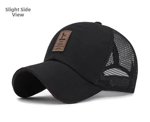 Side view of black breathable mesh baseball cap with brown leather brand patch
