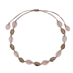 Detail of Bohemian shell choker with gold alloy accents and adjustable woven cord