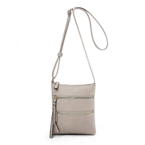 Close-up of light grey multi-pocket crossbody bag with long tassel zippers and leather texture