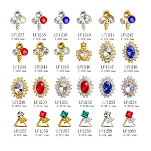 Macro display of assorted alloy earring studs with colorful rhinestones and size labels