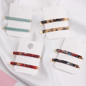Minimalist acetate hair clip set in various marble patterns for elegant styling