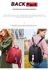 Close-up of waterproof nylon backpack with vertical zipper and cute cat keychain charm