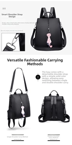 Multi-way black nylon backpack with detachable strap, anti-theft design, and cat pendant