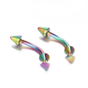 Macro shot of two rainbow plated stainless steel curved barbells with cone ends