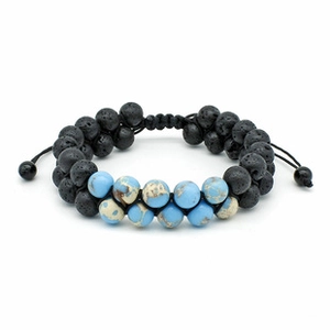 Detailed view of dual-layer bracelet with black lava stone and blue imperial beads