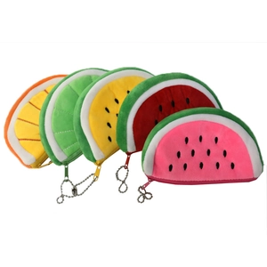 Variety of half-round plush fruit coin purses including watermelon, orange and lime designs